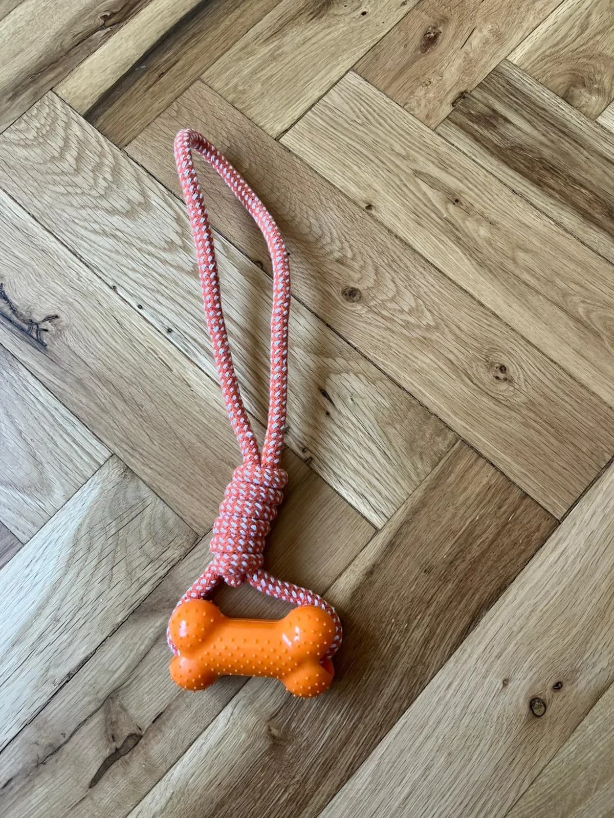 Preťahovadlo pre psov s gumovou kosťou a pevným lanom, 31 cm, oranžové
